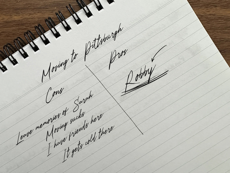 a handwritten pros and cons list written on lined paper. The cons include leaving memories of sarah, moving sucks, I have friends here and it gets c old there. The pros is just Robby underlined a few times