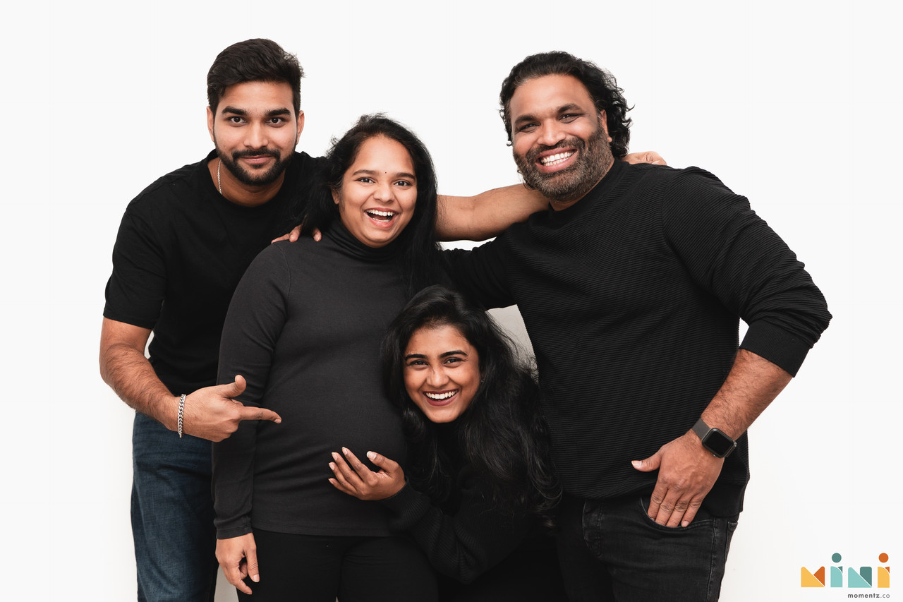 South Indian maternity photography Birmingham — intimate home portrait, warm natural light