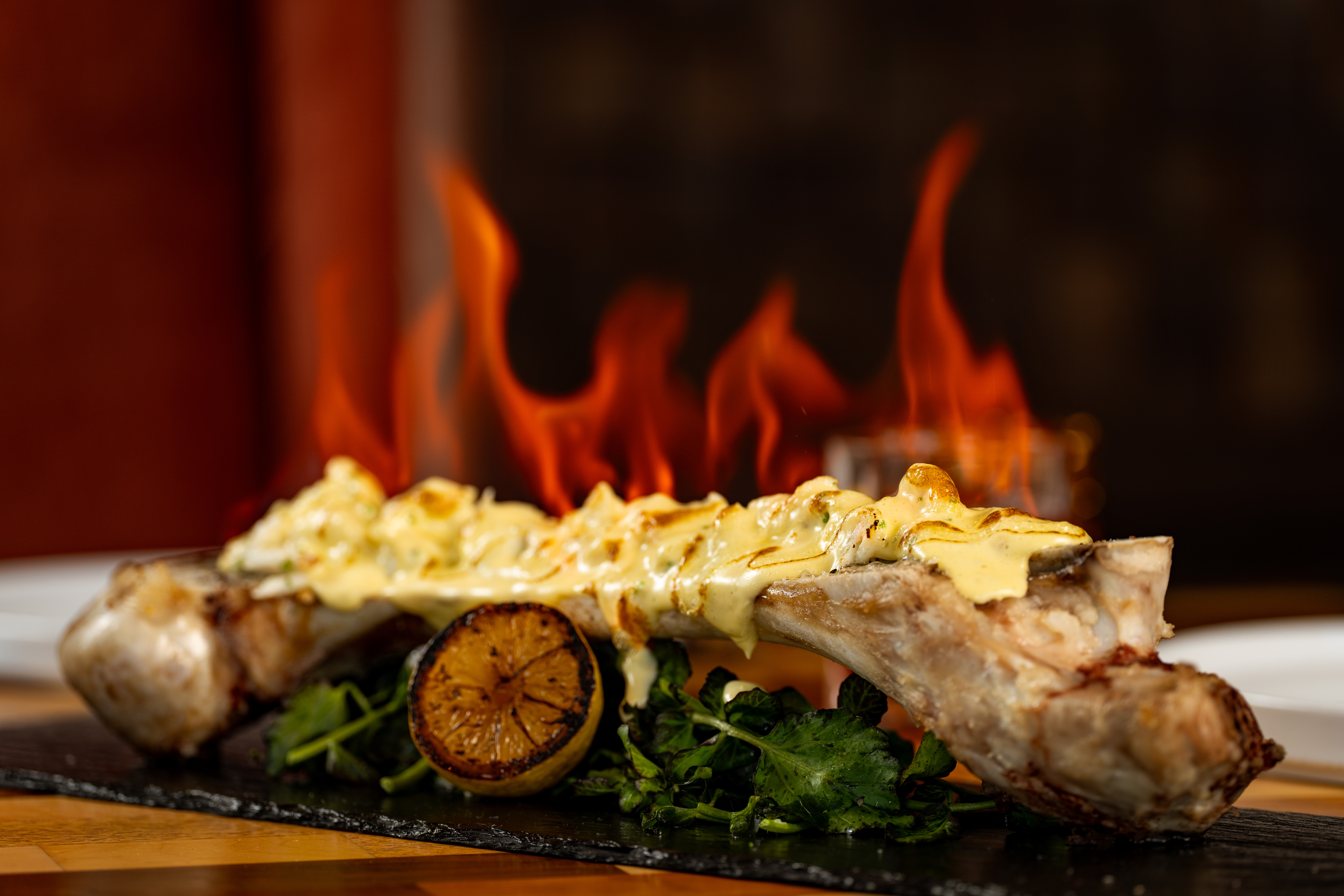 Flambéed dish preparation at tableside