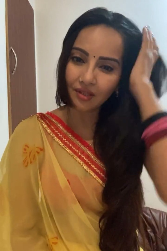 Geetanjali Mishra Sexy Cleavage and armpit though in Orange sleevless saree.mp4_snapshot_07.18.997