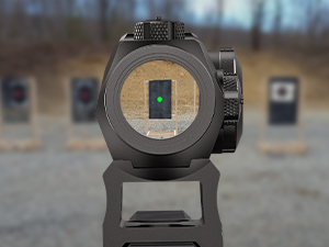 A clear view through the EZshoot 2MOA red dot sight showing the crisp reticle