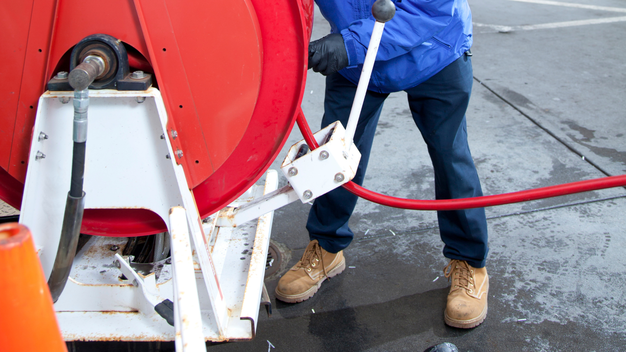 Hyro jetting plumbing truck working in Albuquerque city streets