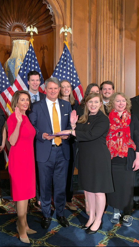 House Speaker Nancy Pelosi of Calif., right, poses during a ceremonial swearing-in with Rep. Lizzie Pannill Fletcher, D-Texas, on Capitol Hill in Washington, Thursday, Jan. 3, 2019