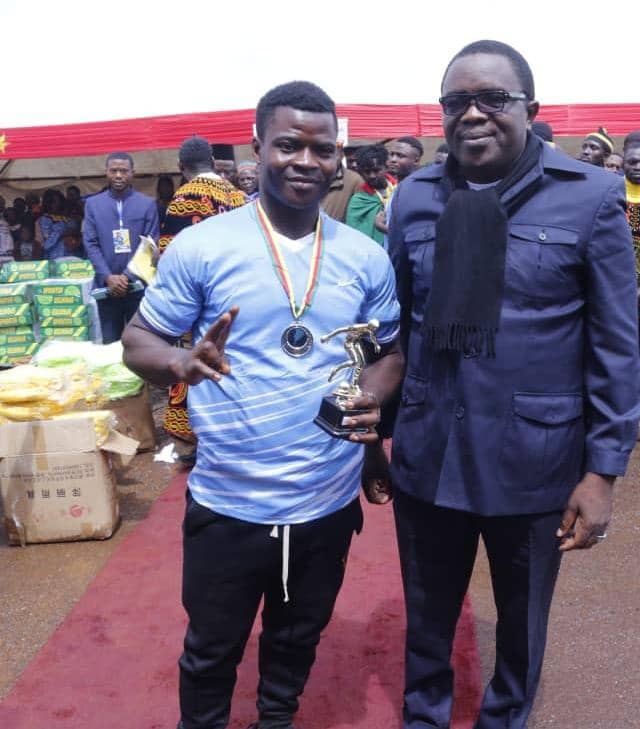ACUDAB Peace Tournament "Living Together" Ernest Ngwa Best IDP Football Award medal and Trophy Player handed by Member of Parliament Hon Nji Fedlis.