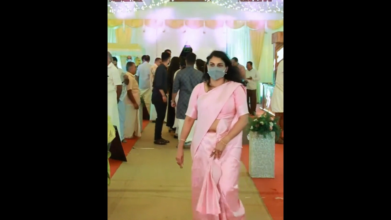 Malayali lady casually show open navel in pink saree mp4 snapshot 00 07 637