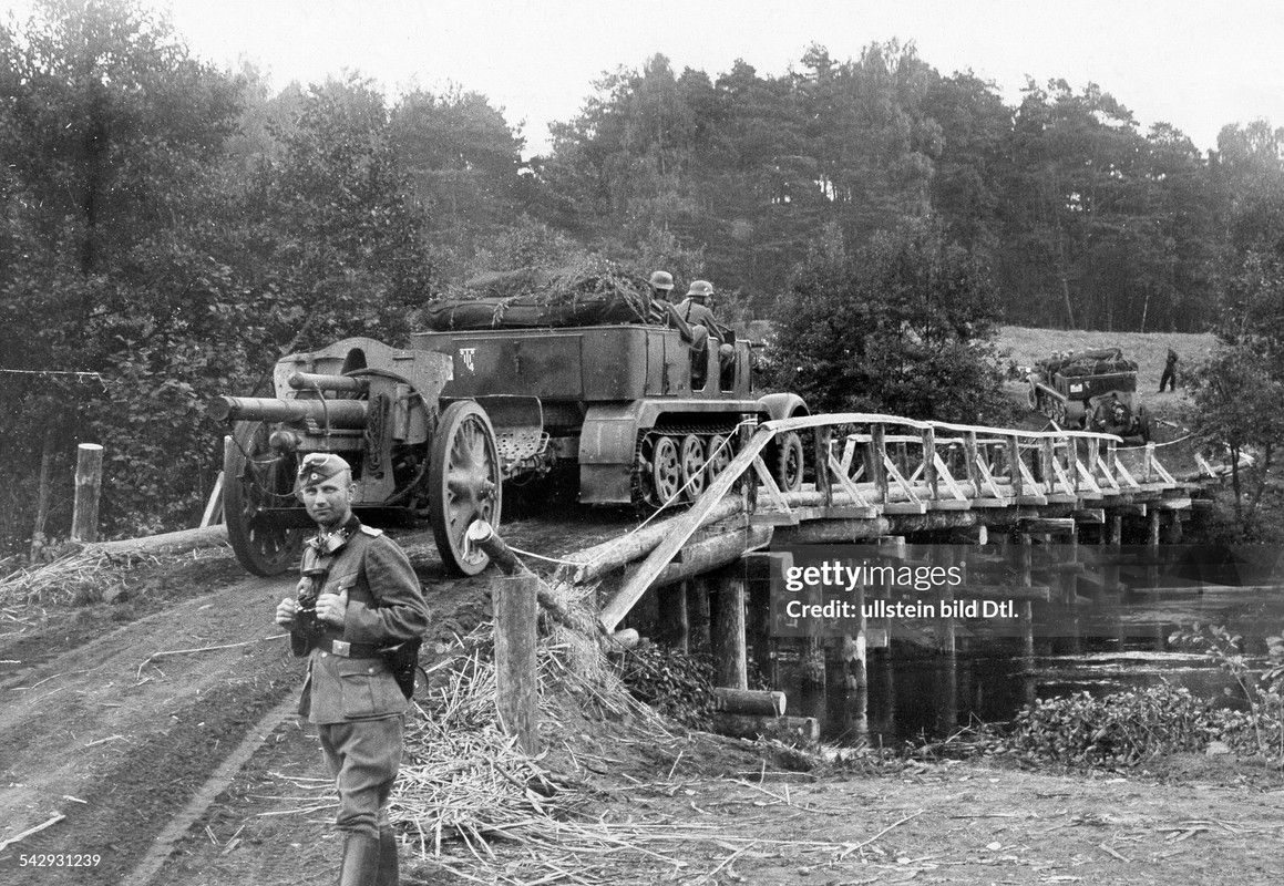 motorized field artillerie (half-track) crossing the river Brahe (Brda west-prussia) on a emergency 