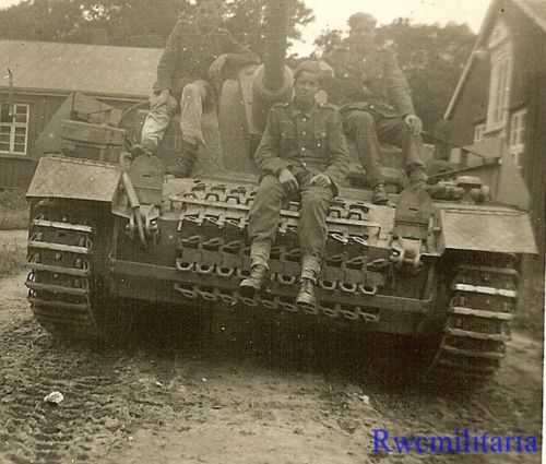 Wehrmacht Troops Posed on Front of Sturmgeschütz Panzer Tank