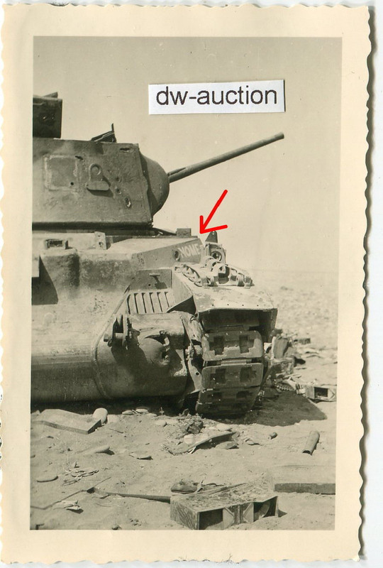 zerstörter Panzer mit Schriftzug durch Fallschir