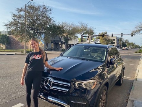 Danielle Collins with her car