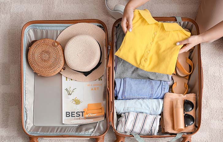 Suitcase packed for vacation