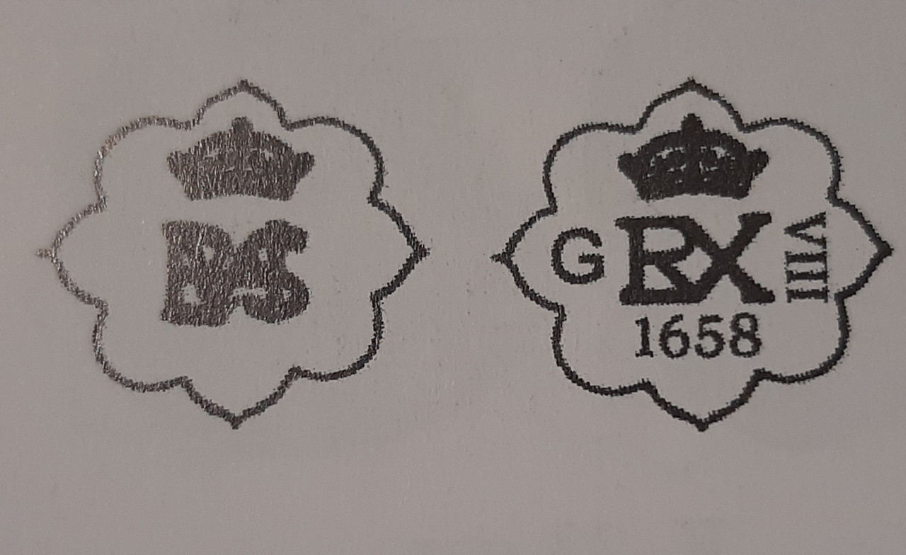 8 maravedís del anagrama sobre cospel virgen de Felipe IV, Granada 1658. Dise-o-resello-G