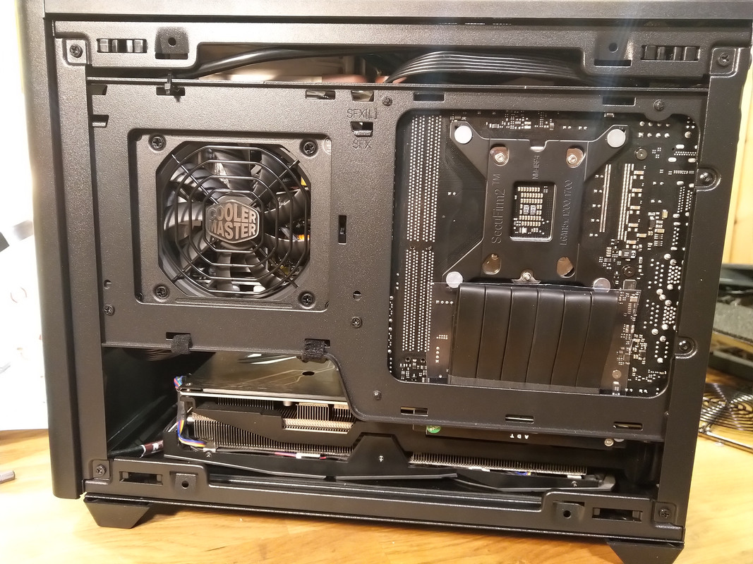 Log NR200 with sidemounted 140mm intake fan Alpenföhn Black Ridge and Noctua NHC14S SFF