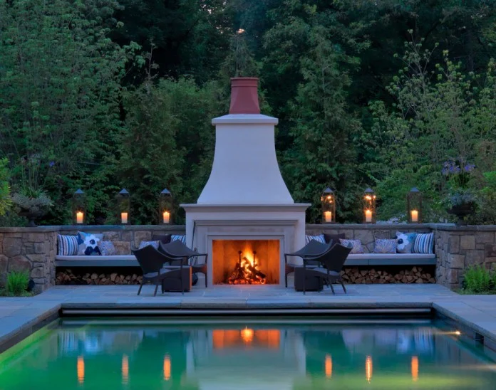gorgeous-outdoor-fireplace-pool-seats.webp