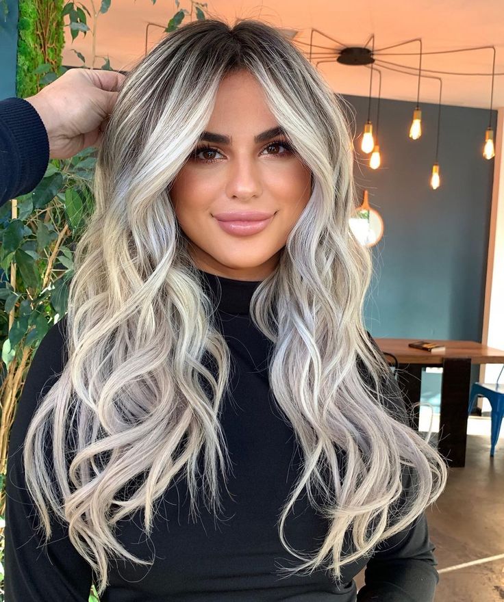 Long ash blonde wavy hair