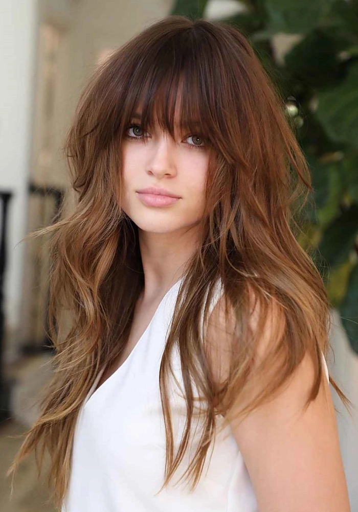 Long brown shag with long bangs octopus haircut for round face