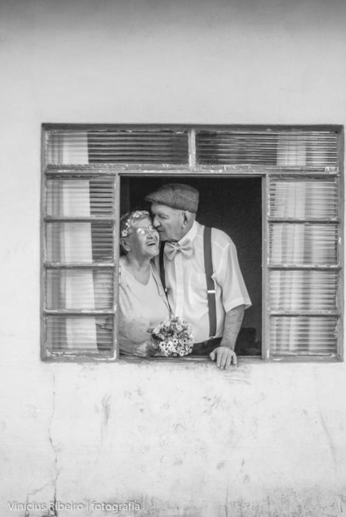 blacknwhiteoldcouplewindow.jpg