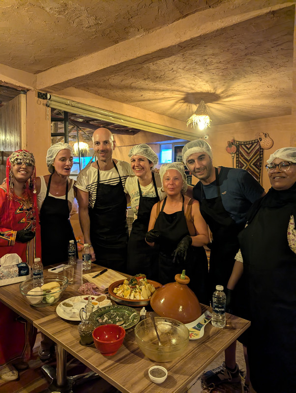 Guests enjoying a Moroccan cooking class at Chez Moussa in Aït Benhaddou