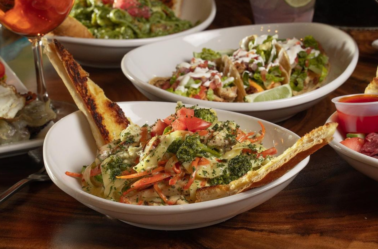 Restaurant pasta bowl photographed with warm dining room light for a Chicago food photography portfolio