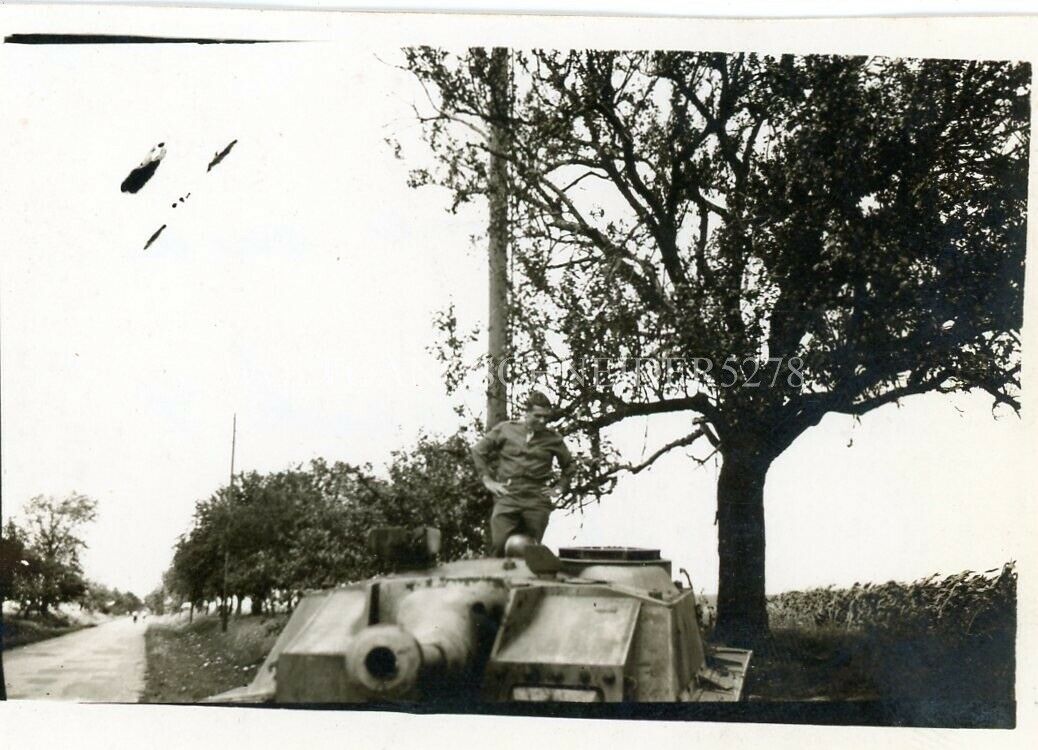 GI Atop KO’d Sturmgeschütz Tank, Germany
