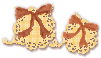 Two yellow doilies with two brown ribbons on top