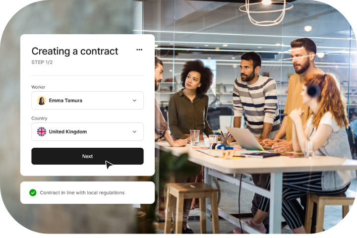 Man reviewing sticky notes posted on a glass wall