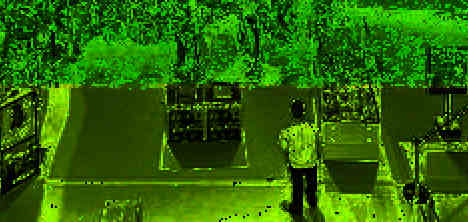 a data-moshed image that mostly looks like black and green noise