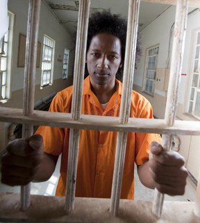 young-african-american-man-behind-bars-1