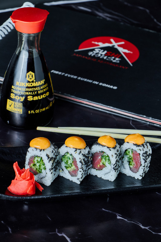 A close-up of delicious-looking sushi rolls.