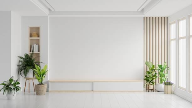 An empty room with light coming from a window.