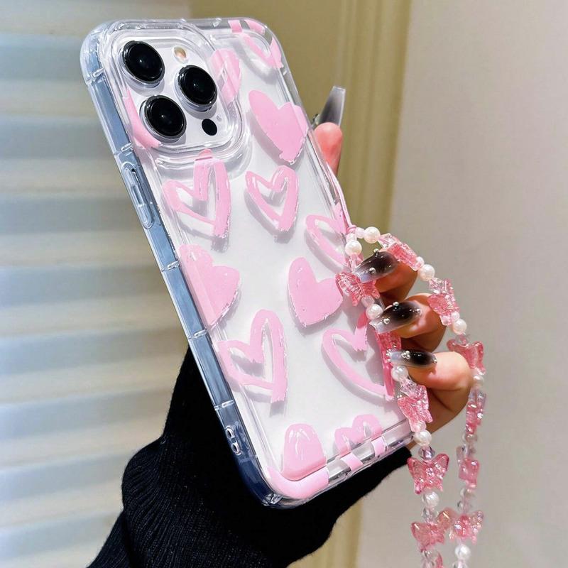 Foto de Funda transparente con diseño corazón. Incluye correa de mano.