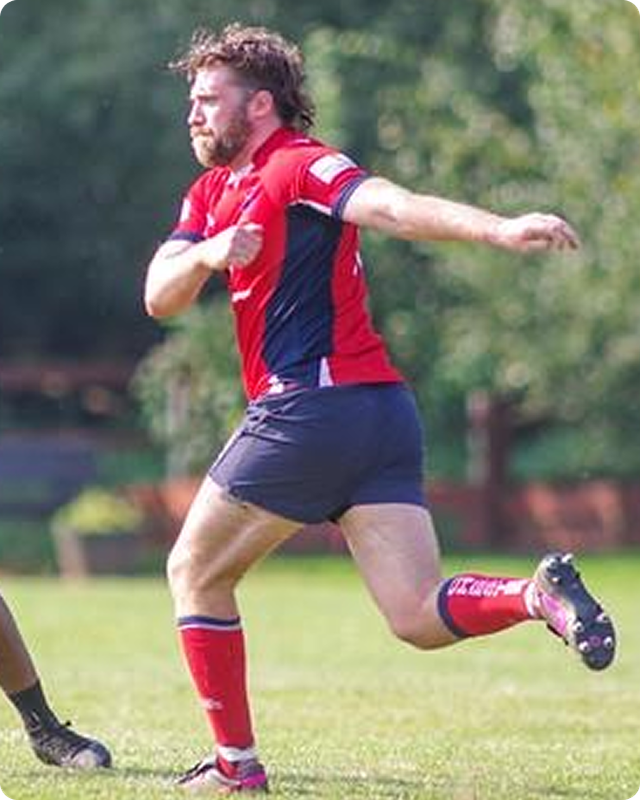 James Ferguson playing rugby