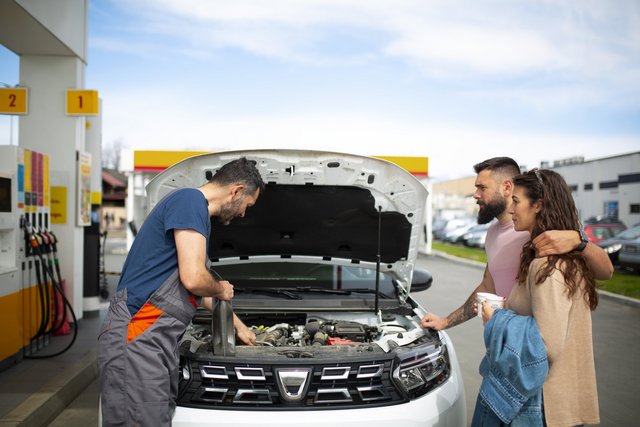 The Importance of Regular Car Battery Maintenance People-spending-time-gas-station-min-Easy-Resize-com