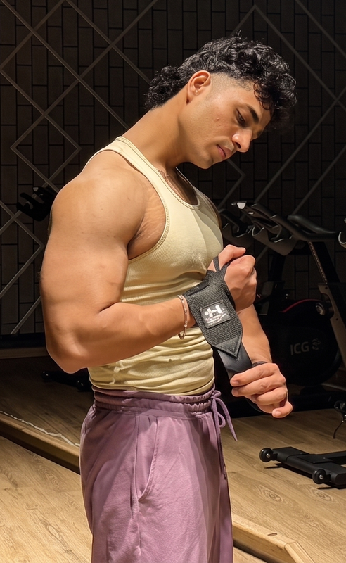 Athlete using AesirFit wrist wraps during weightlifting