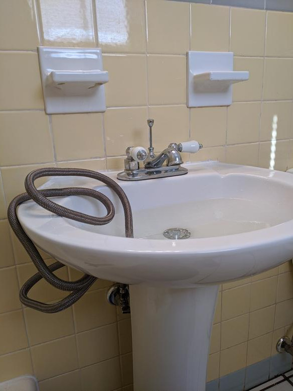 Cloudy hot water coming from one faucet