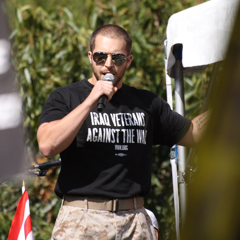 Adam Kokesh speaking at an anti-war protest in September 2007 wearing combat uniform