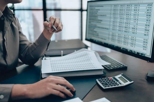 C Hive LLC team reviewing financial charts