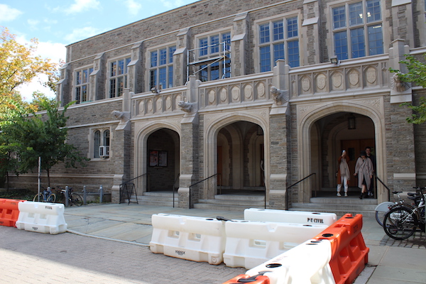 stone exterior of Dillon gym on sunny fall day