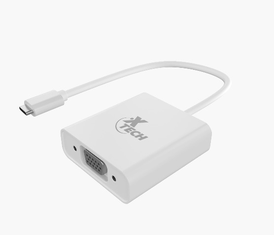 El adaptador conectado a una laptop, proyectando la imagen a un monitor.