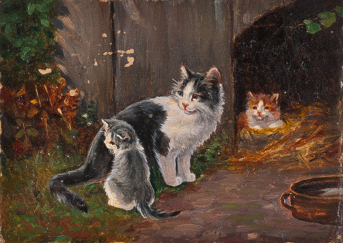 Katzenmutter mit zwei Kätzchen