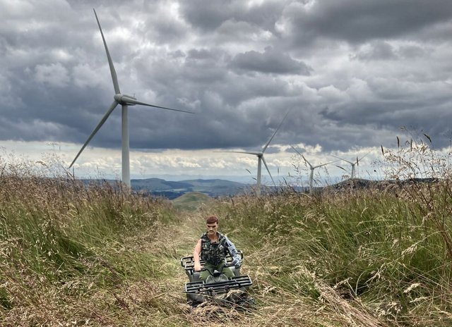 A henchmen quad biking though a place called green knowes wind farm 69-AD7-F15-159-D-410-E-8-C23-C1-CACA425249