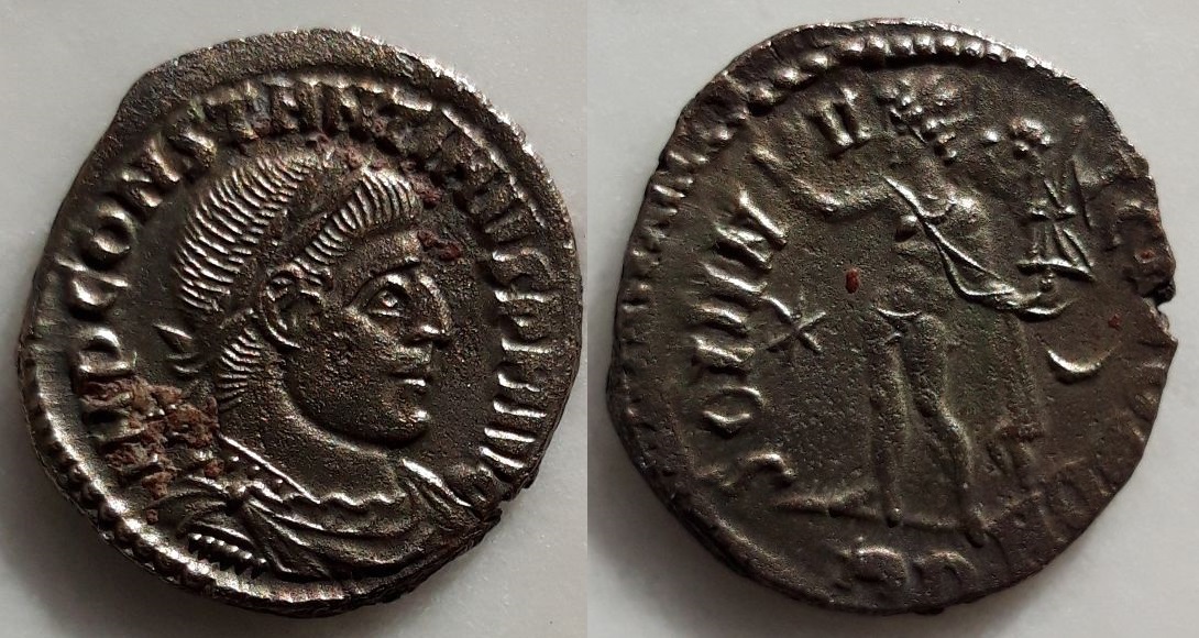 Nummus de Constantino I. SOLI INVICTO COMITI. Sol a izq. Roma Ci-nir1