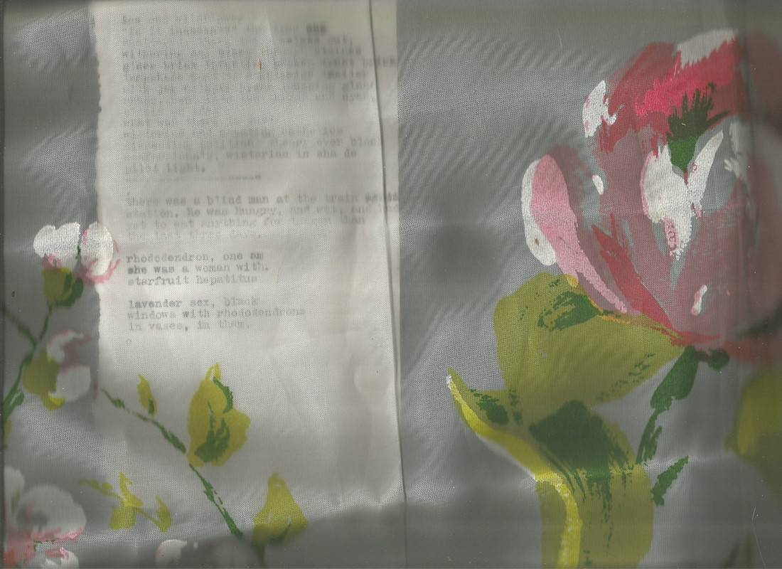flowers in faint fabric and pale words