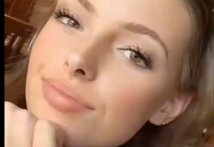 Hot Girl Is Striking A Sexy Pose And Showing Off Her Body.