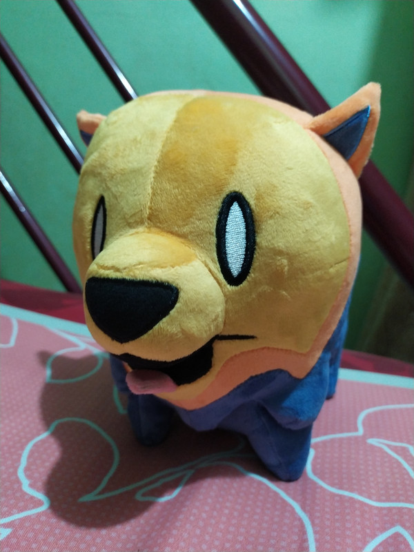 Front view of the official Cassette Beasts Pombom plushie