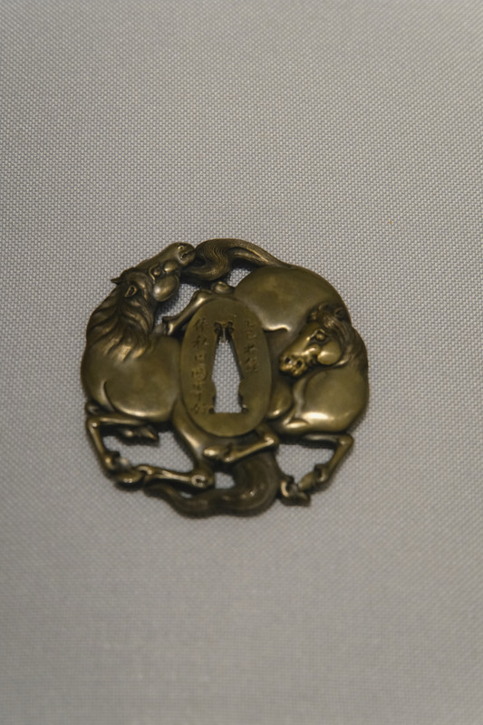 Samurai sword guard, known as a tsuba