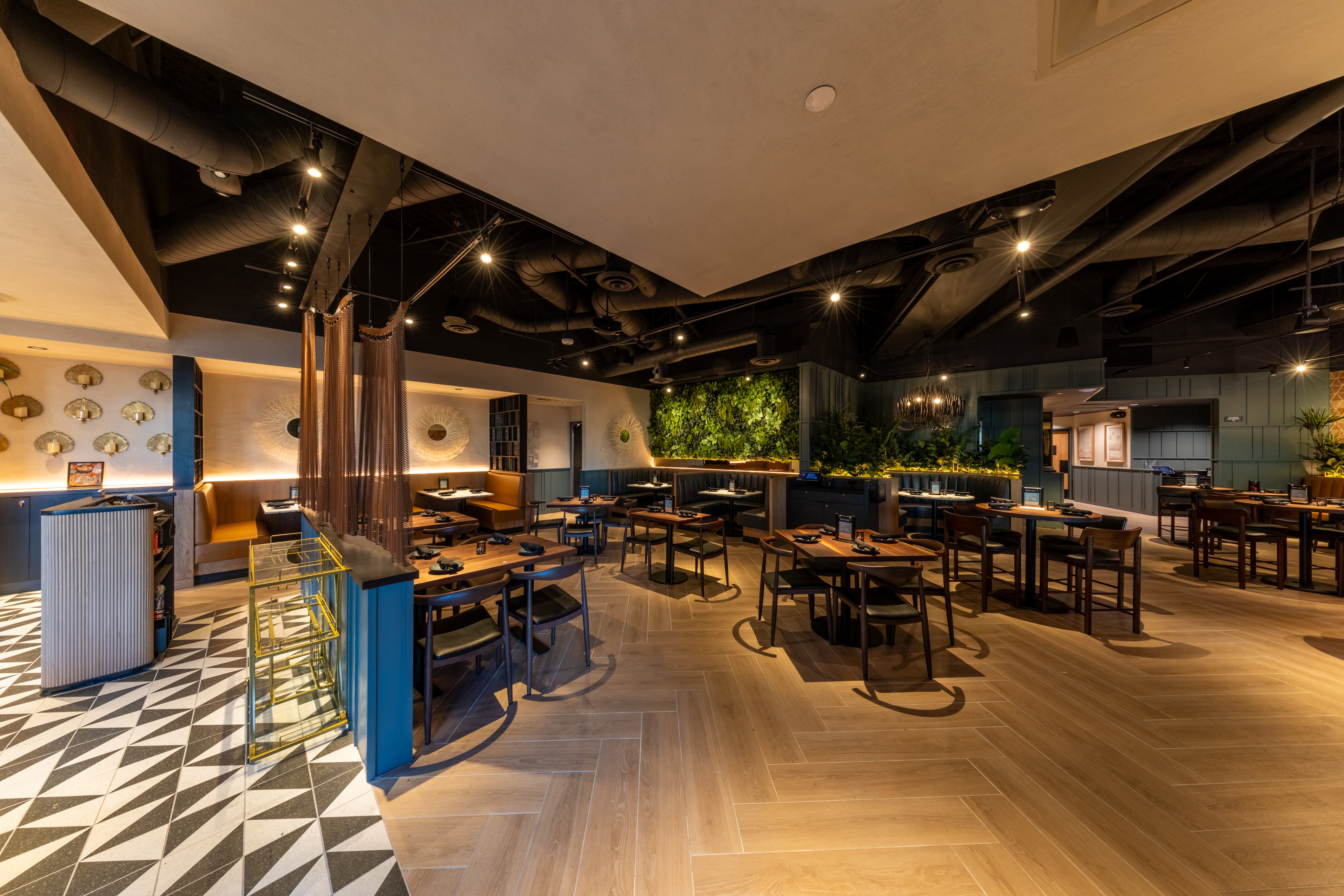 La Popular's sophisticated dining room with warm lighting