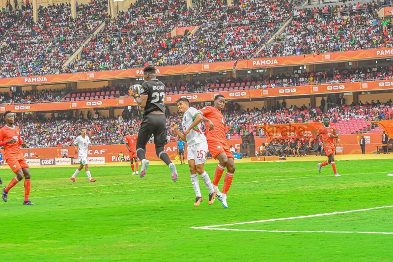 Kenyan goalkeeper catching the ball during Sunday match