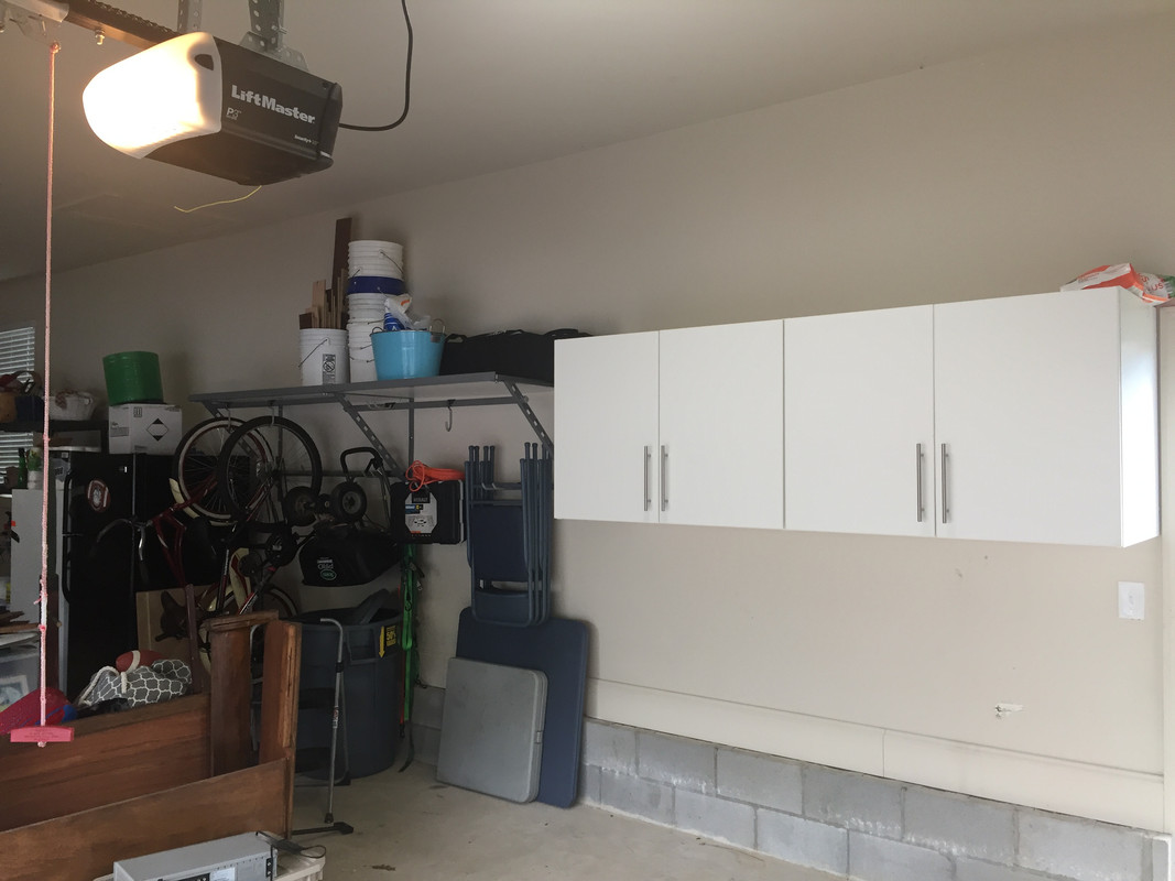 Storage Options for Long and Medium Hand Tools for Yards Hang a rack on the ceiling to hang heavy items in the garage