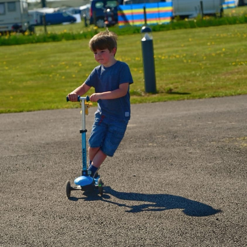 Harry on a scooter