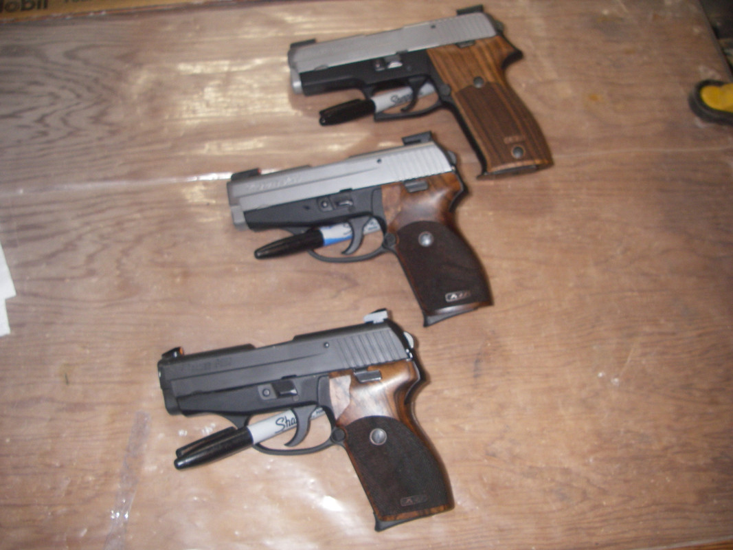 three sig's with walnut 006